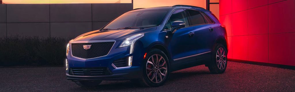 2025 Cadillac XT5 parked in front of a house