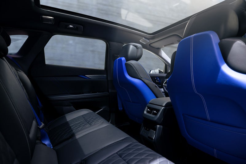 Back Seat View of the 2026 OPTIQ-V Blue Front Seats, Sun Roof, and Interior | AutoNation Cadillac West Amarillo in AMARILLO TX